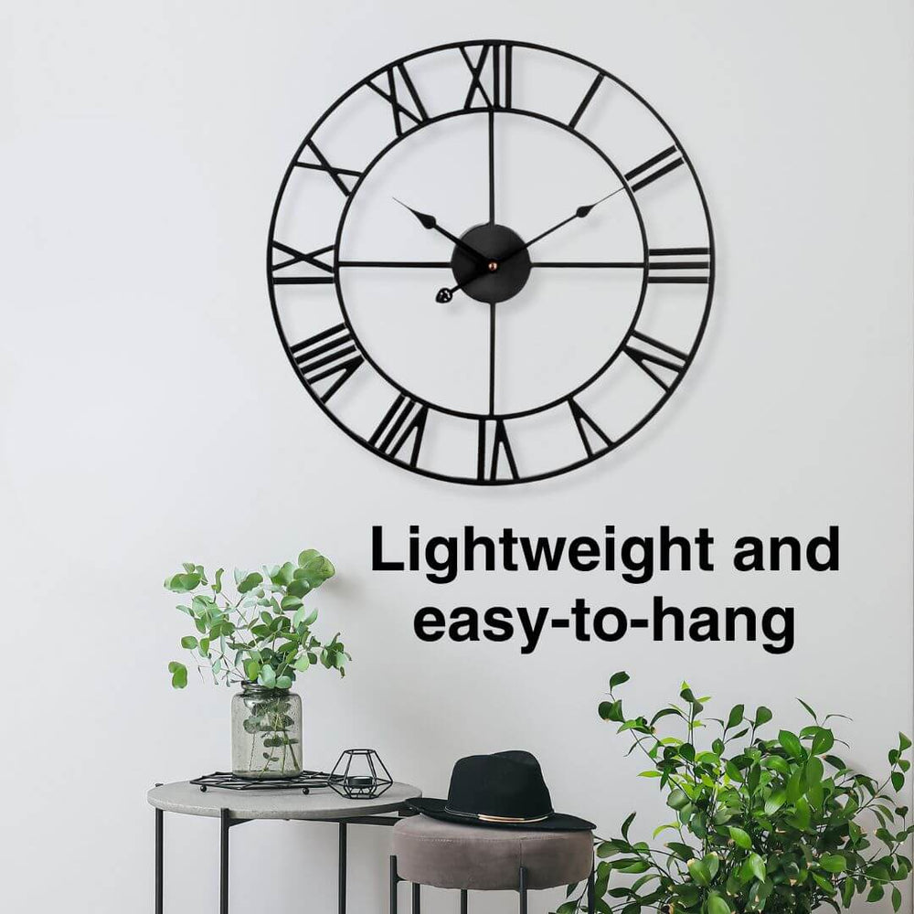 Black metal wall clock styled in contemporary Australian home, lightweight, easy to hang