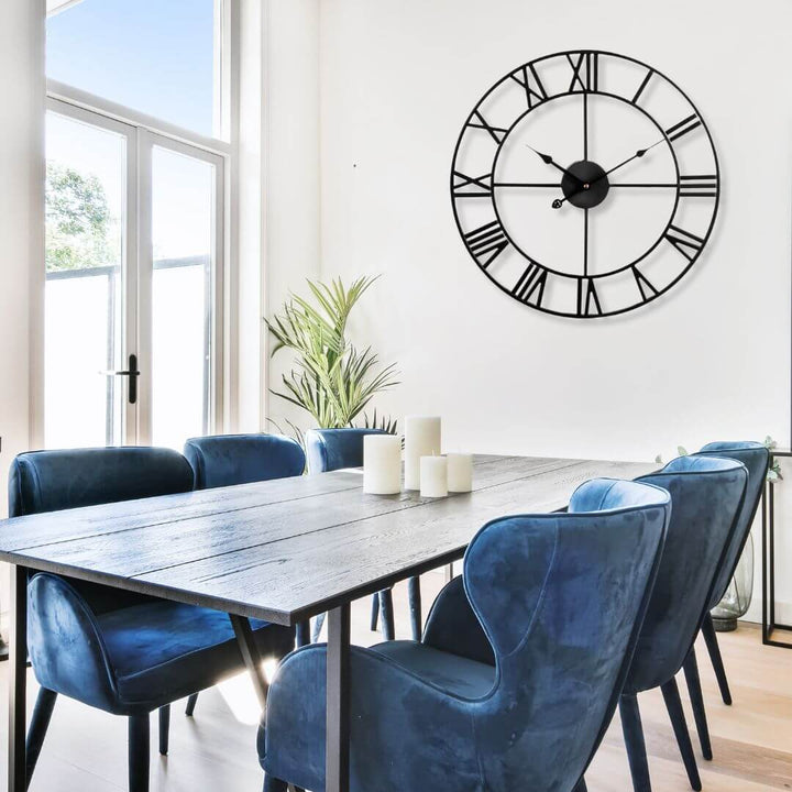 80cm black metal wall clock with Roman numerals on dining room wall