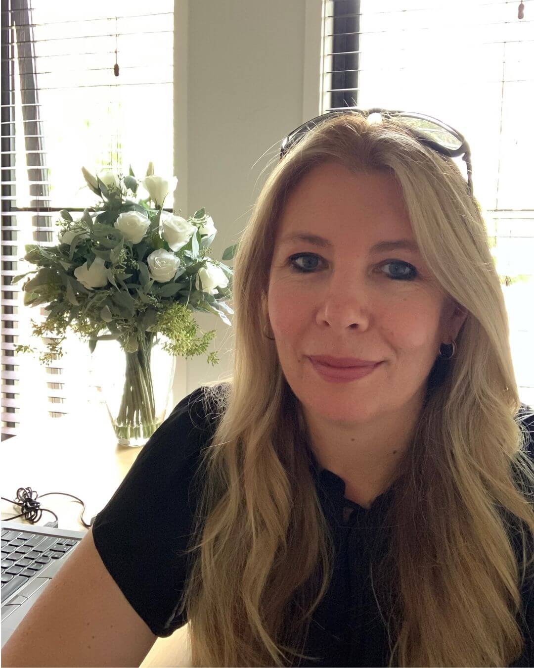 Sandra Da Silva, founder of Beautiful Home Decor, smiling warmly in a cozy styled room
