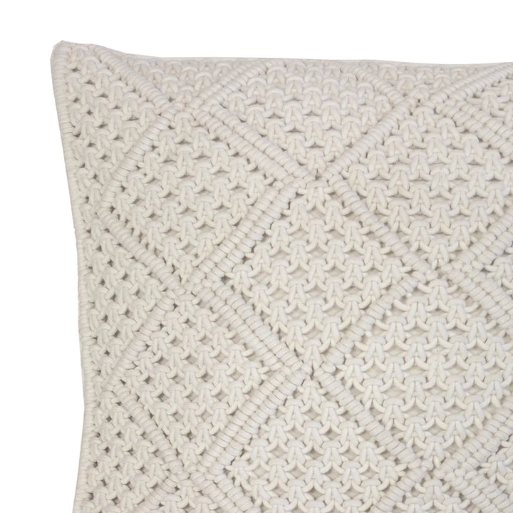 The 45cm square Anka Ivory Macrame Cushion with a hand crafted diamond macrame pattern is in an Ivory Colour