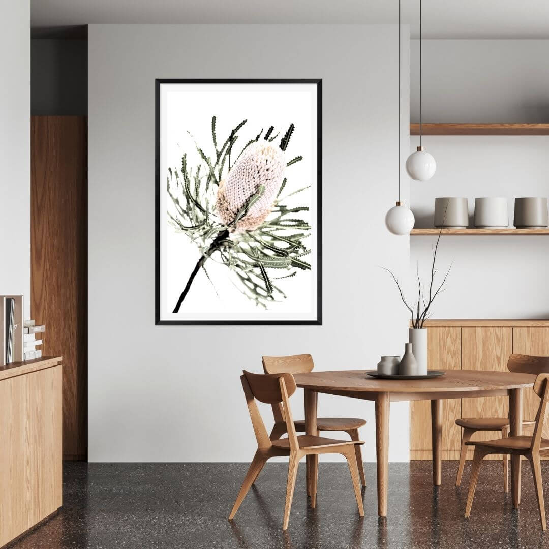 An Australian native peach Banksia flower is featured in this floral art Australian print on a wall in the dining room.