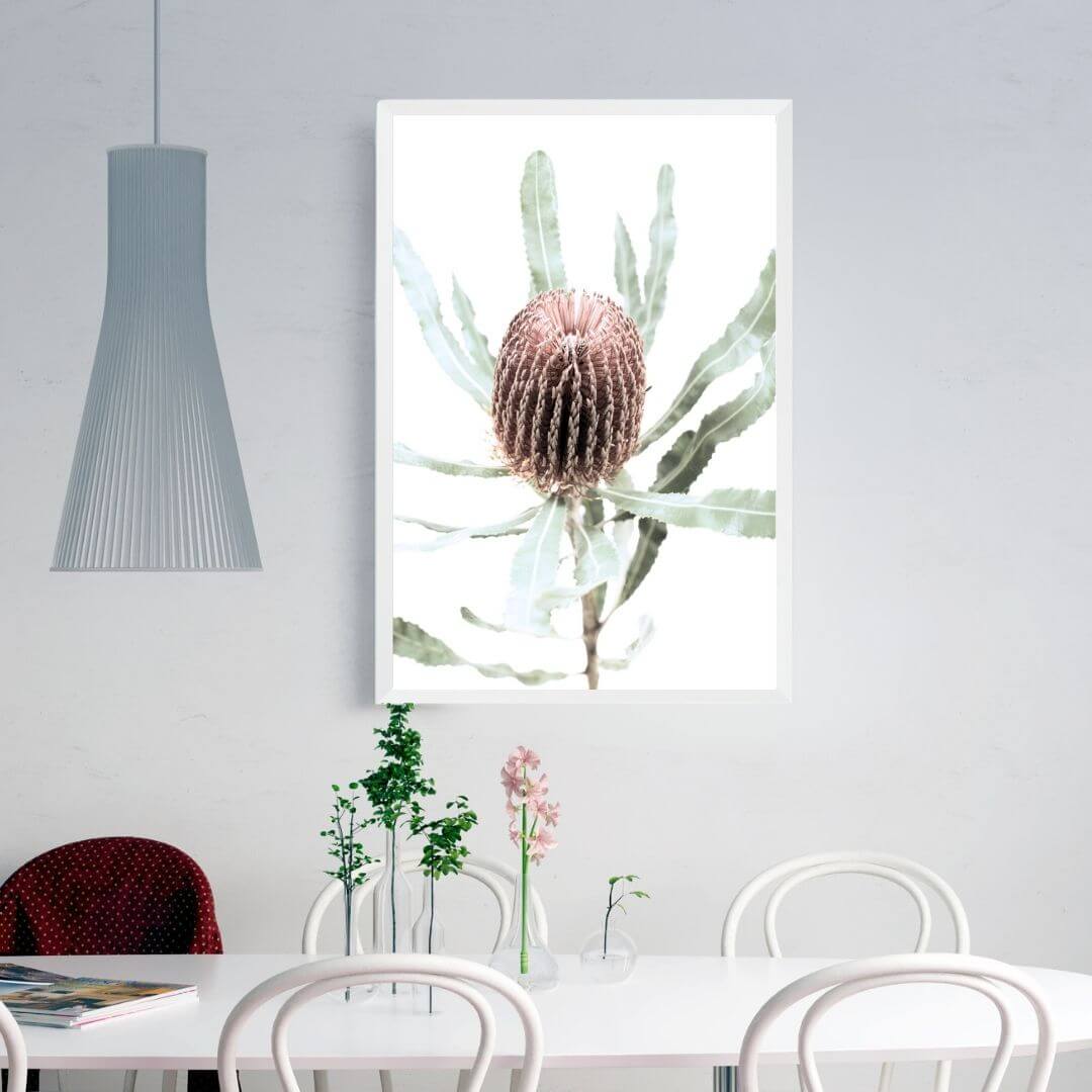 An Australian native peach Banksia flower B is featured in this floral art print on a wall in the dining room.
