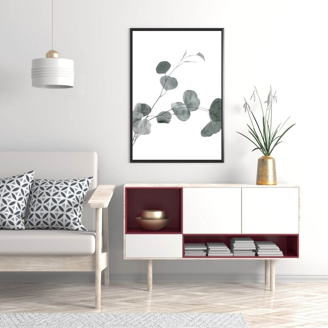 A wall art photo print of an Australian native eucalyptus leaves B with a black frame, no border on office study room wall