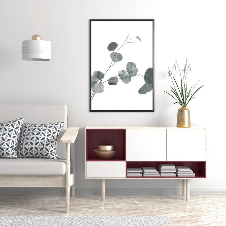A wall art photo print of an Australian native eucalyptus leaves B with a black frame, no border on office study room wall