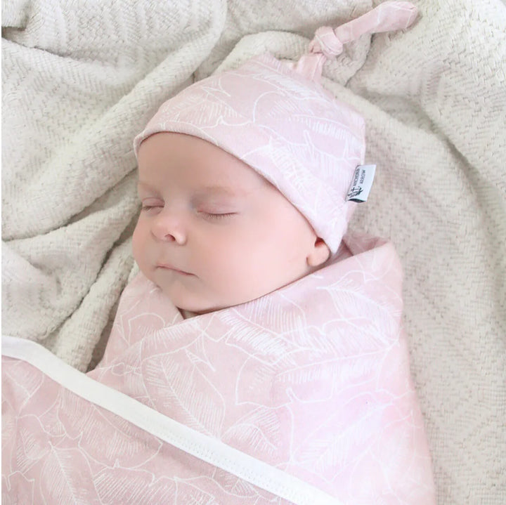 Anchor and Arrow baby swaddle wrap and beanie set in Pink Palm, soft jersey cotton for  comfort.