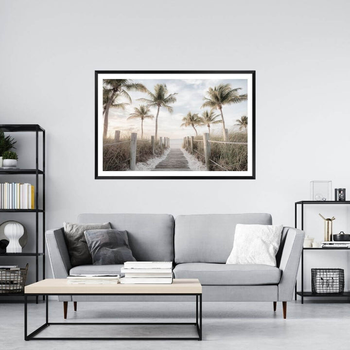 A coastal wall art photo print of a pathway to a beach on the keys Florida with palm trees with a black frame or unframed to decorate a wall in your living room