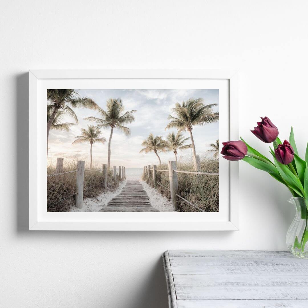 A coastal wall art photo print of a pathway to a beach on the keys Florida with palm trees with a white frame or unframed to style shelves and empty walls