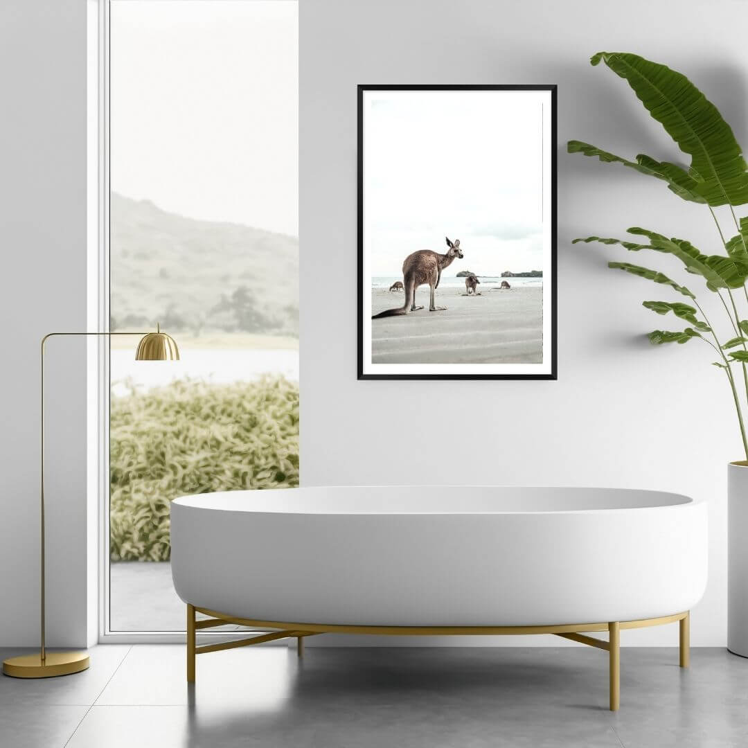 A wall art photo print of beach side kangaroos with a black frame or unframed to decorate a wall in your bathroom