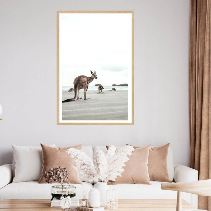 A wall art photo print of beach side kangaroos with a timber frame or unframed to decorate an empty wall