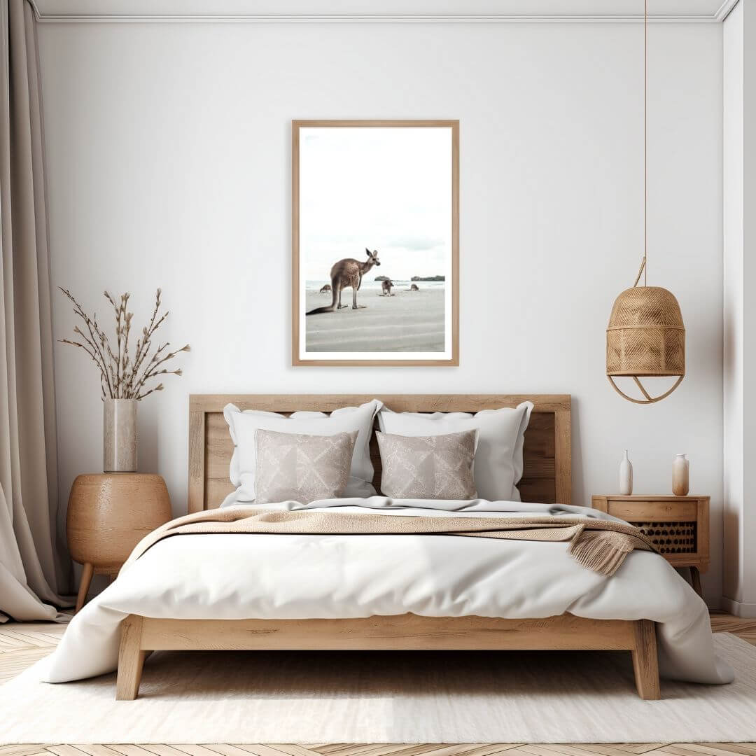 A wall art photo print of beach side kangaroos with a timber frame to decorate your bedroom walls