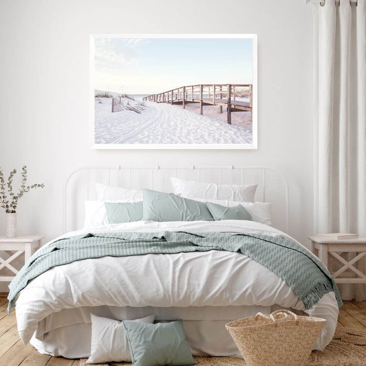 A coastal wall art photo print of a beachside boardwalk with a white frame or unframed to decorate a wall in your bedroom