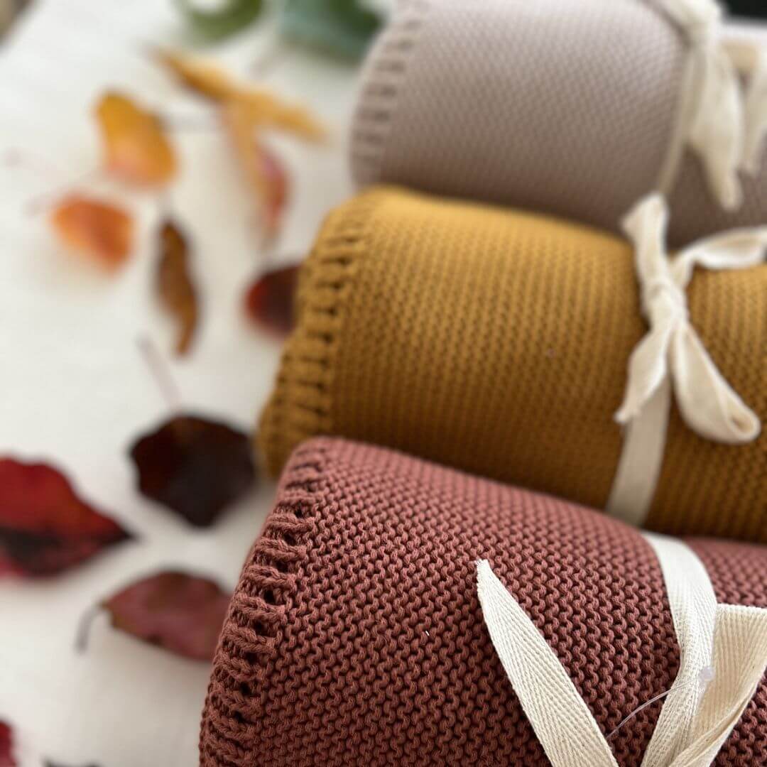 Perfect Baby shower gift ideas include a lusciously soft Cable Knitted Baby Blanket in beautiful Blush Pink to wrap your baby, made by Mini and Me.