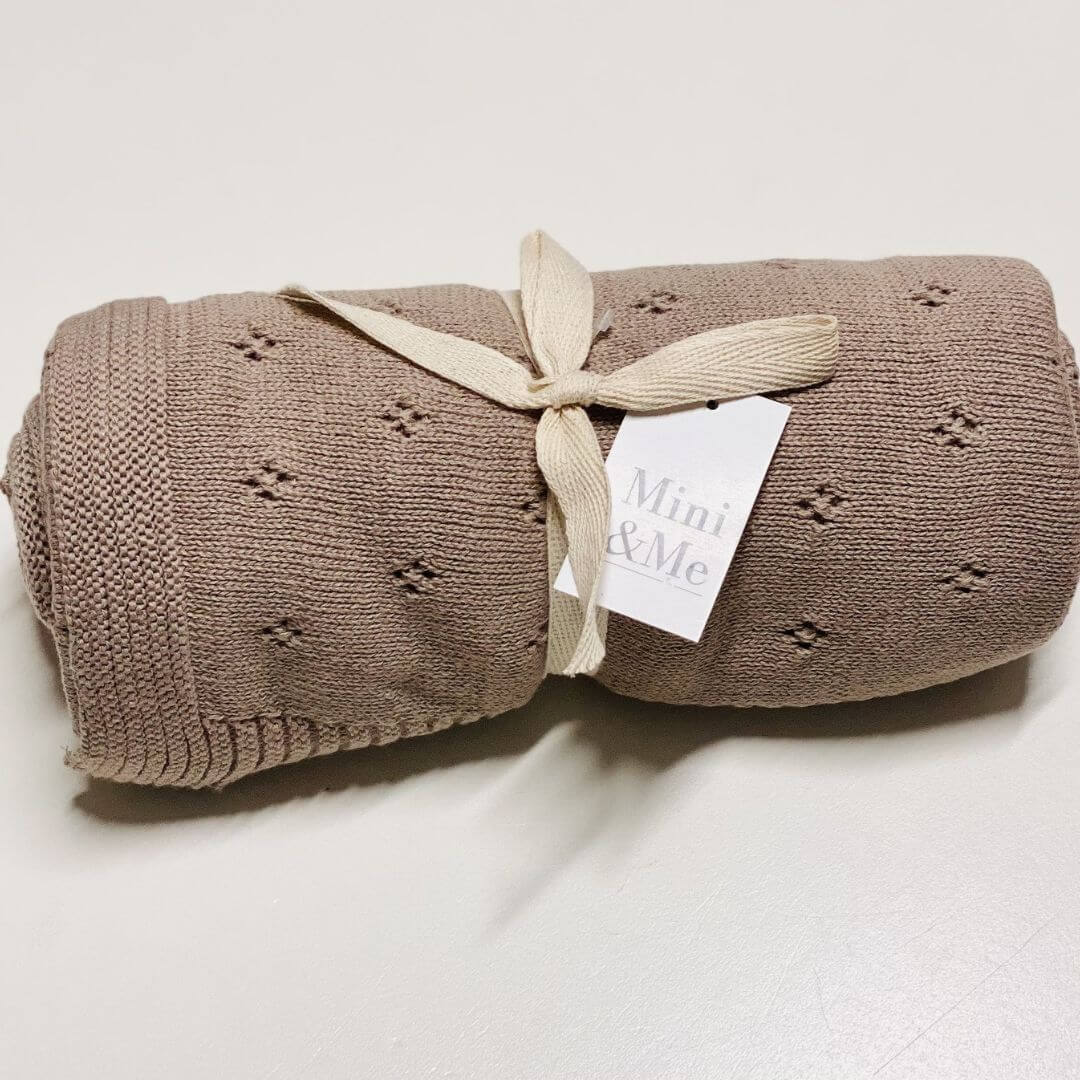 A lusciously soft Mini and Me Heirloom Knitted Baby Blanket in beautiful Enokia Brown Colour to keep your baby and toddler warm