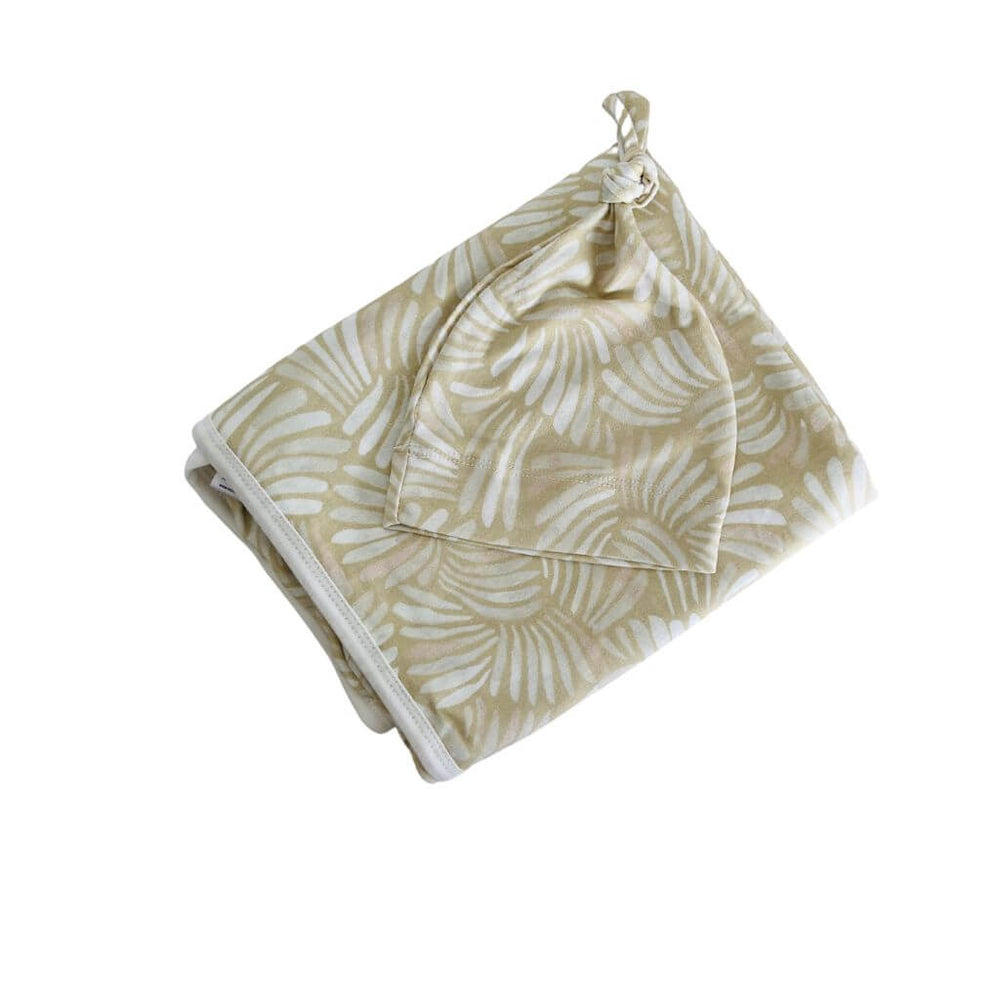 Jersey cotton baby swaddle wrap and beanie in pink Sandy Shell – soft, breathable and made for snuggles.