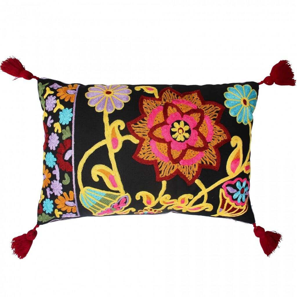 A visually attractive Boho Embroidered Floral Cushion with bright, cheerful colours, maroon tassels on the corners.