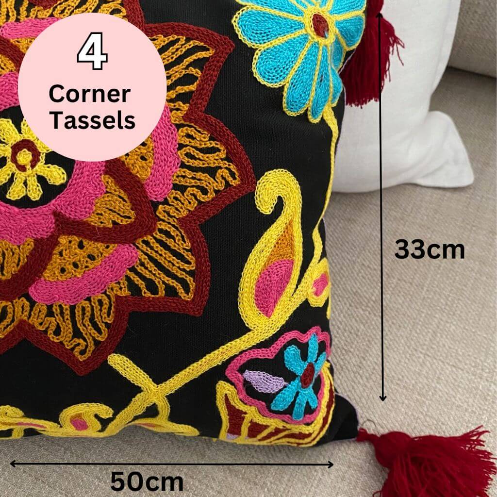 The Rectangle Lumbar Boho Embroidered Floral Cushion has 4 tassels on the corners