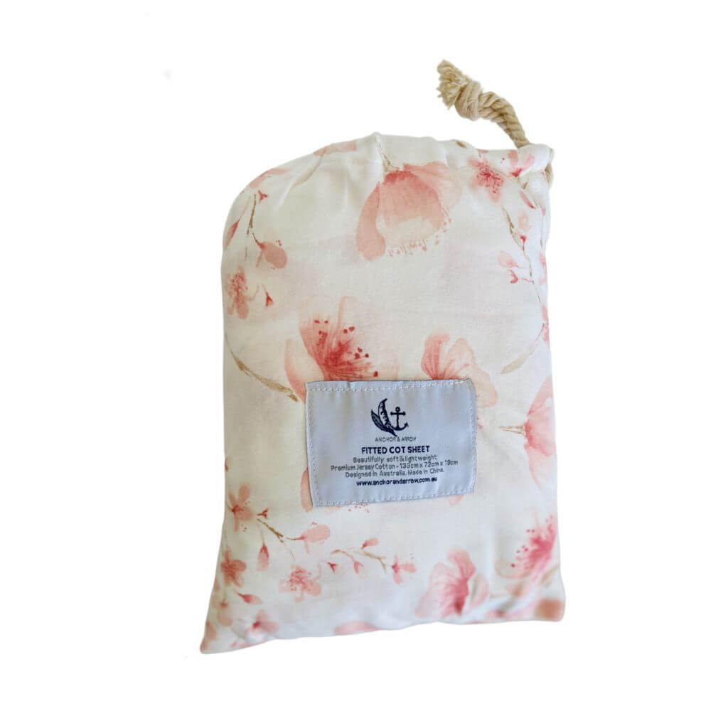 A lightweight Jersey Cotton Fitted Baby Cot Sheet in a gorgeous Cherry Blossom design.