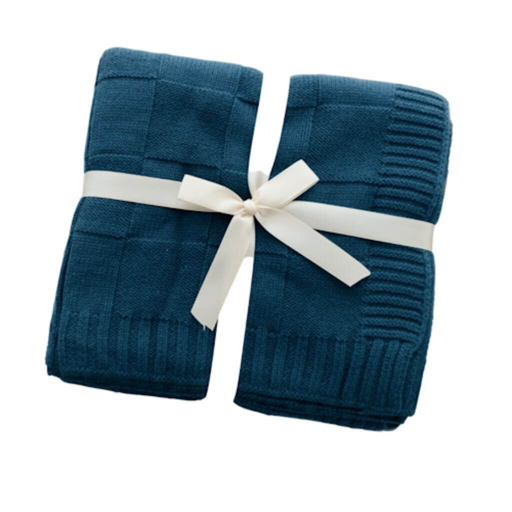 A gorgeous dark blue Knitted Baby blanket by Anchor and Arrow 