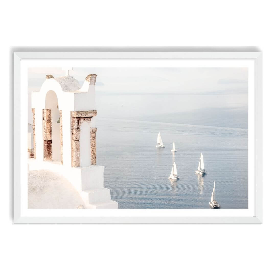A wall art photo print of Boats sailing on the sea in Santorini Greece  with a white frame, white border by Beautiful Home Decor