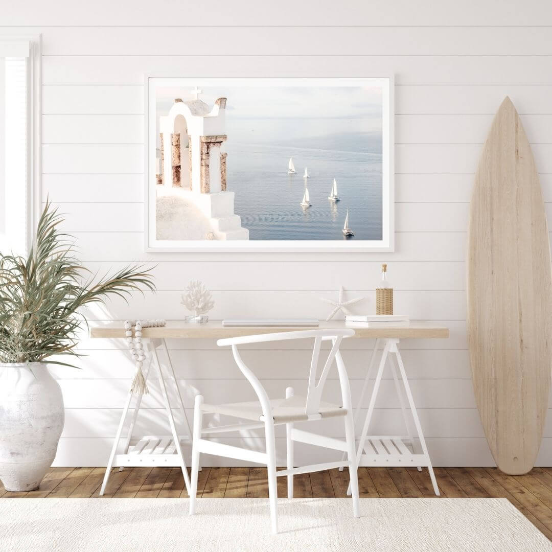 A coastal wall art photo print of Boats sailing on the sea in Santorini Greece  with a white frame or unframed to decorate a wall in your office dining room