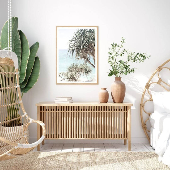 A coastal wall art photo print of the Byron Bay Beach Sea View with a timber frame to style a coastal Australian bedroom