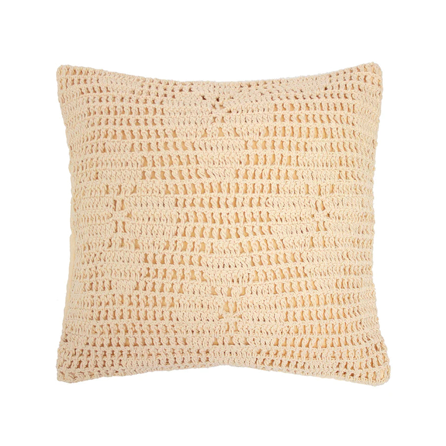 The custard yellow Callista cushion measures 45cm and has a crochet floral design.