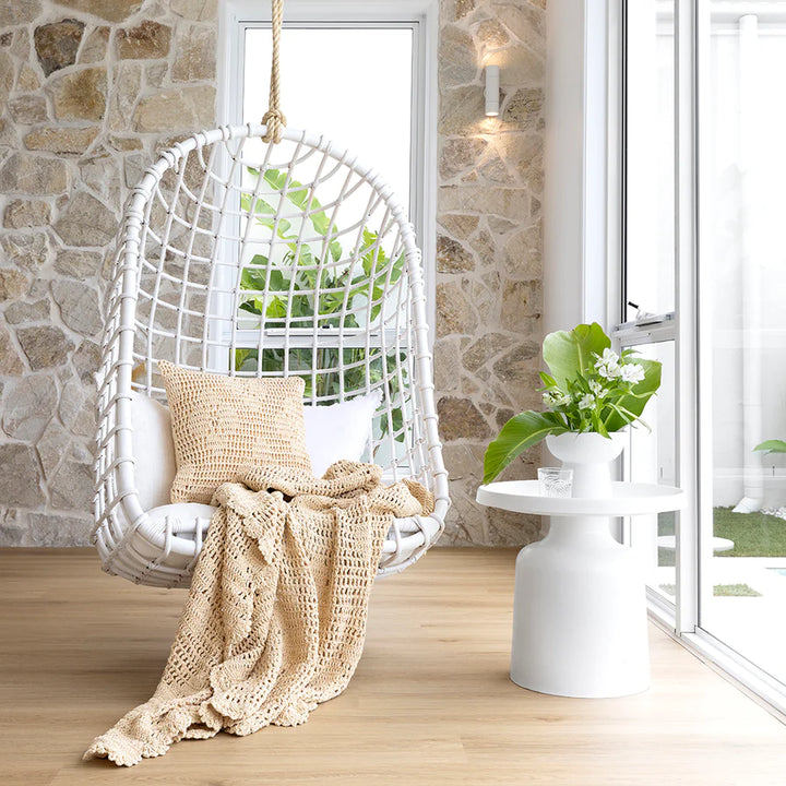 The 45cm square Callista Custard Yellow Crochet Cushion with a floral pattern pairs well with the Callista Throw.