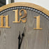 Large Contemporary Grey Wall Clock measuring 60cm with timber numbers and black clock hands.