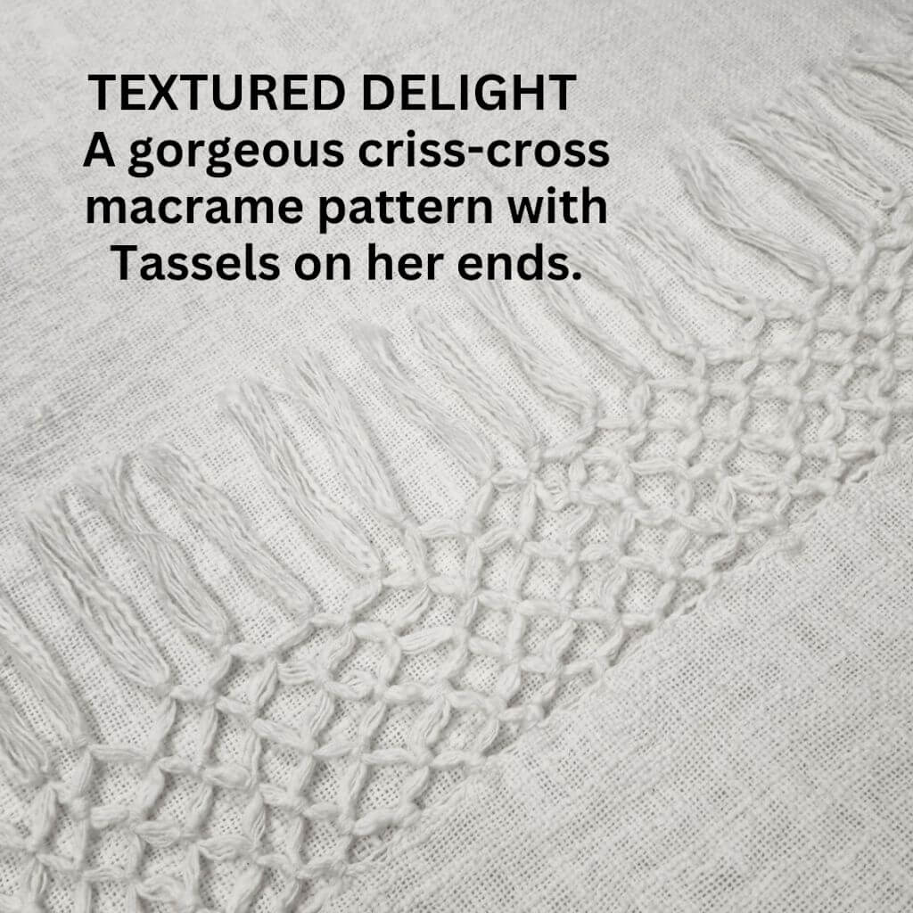With her beautiful macrame patttern tassel edges , the Dove Cotton Throw in Ivory White measures 130cm x 170cm, perfect to decorate your bed or sofa
