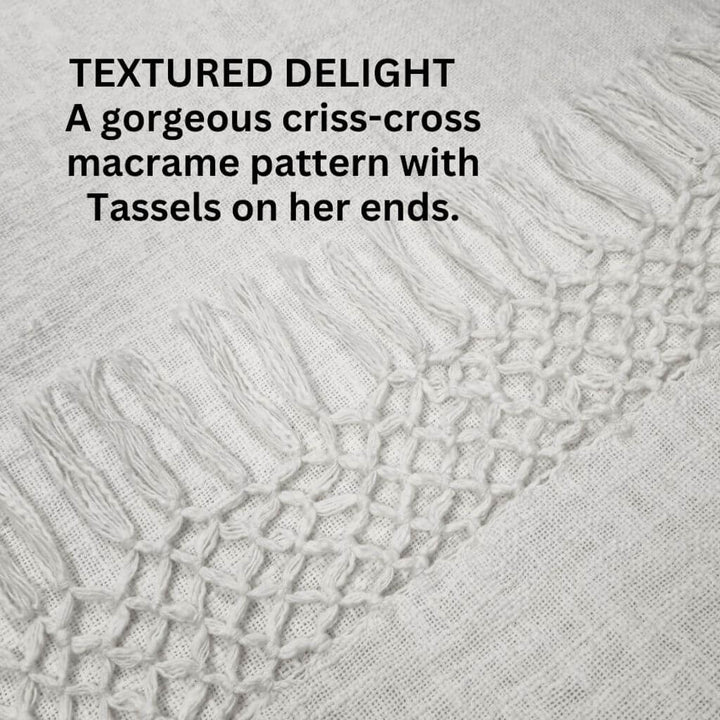 With her beautiful macrame patttern tassel edges , the Dove Cotton Throw in Ivory White measures 130cm x 170cm, perfect to decorate your bed or sofa