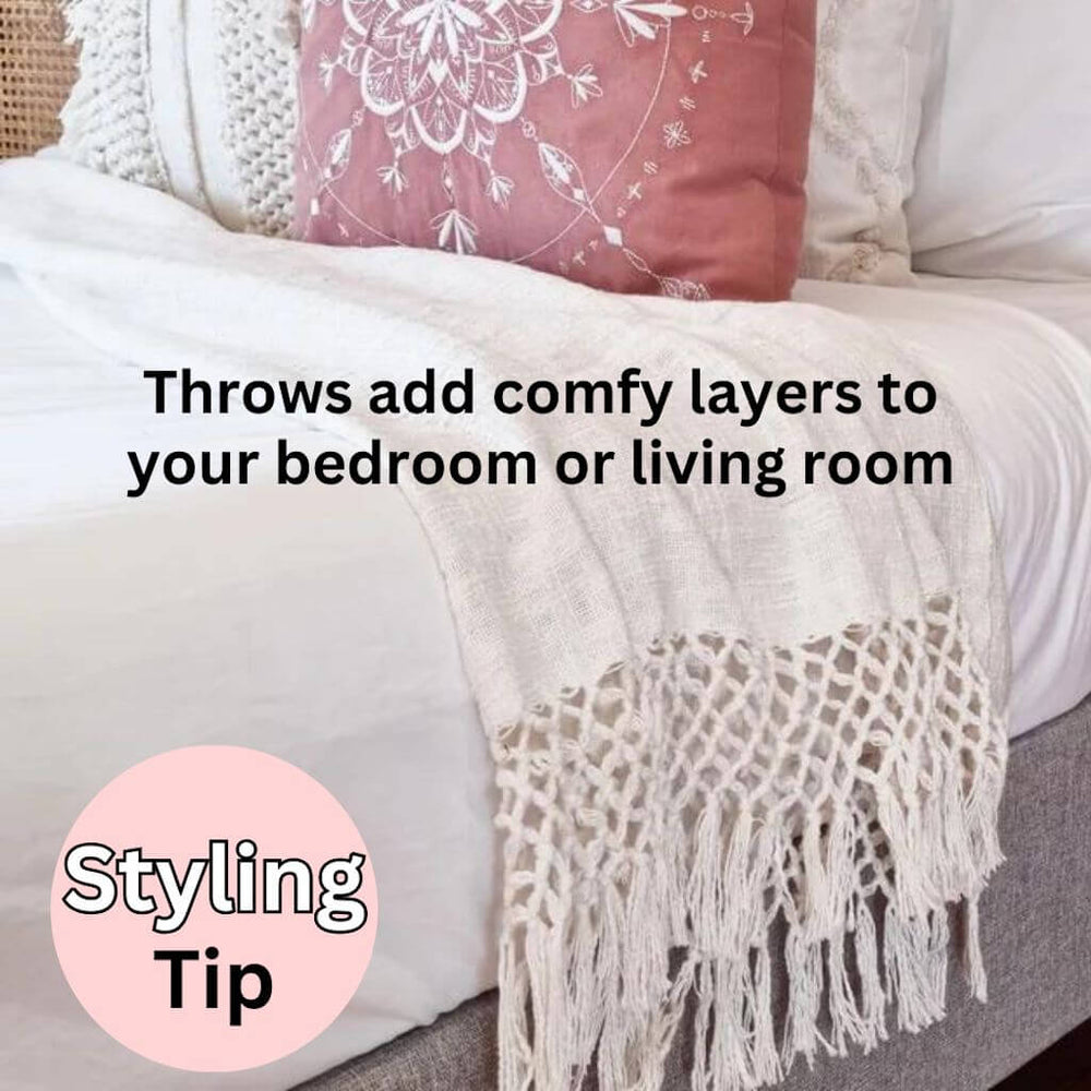 Add comfy layers to your bedroom or living room with the Dove Cotton Throw in Ivory White measuring 130cm x 170cm, perfect to decorate your bed or sofa