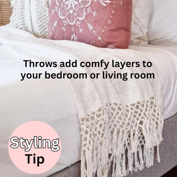 Add comfy layers to your bedroom or living room with the Dove Cotton Throw in Ivory White measuring 130cm x 170cm, perfect to decorate your bed or sofa