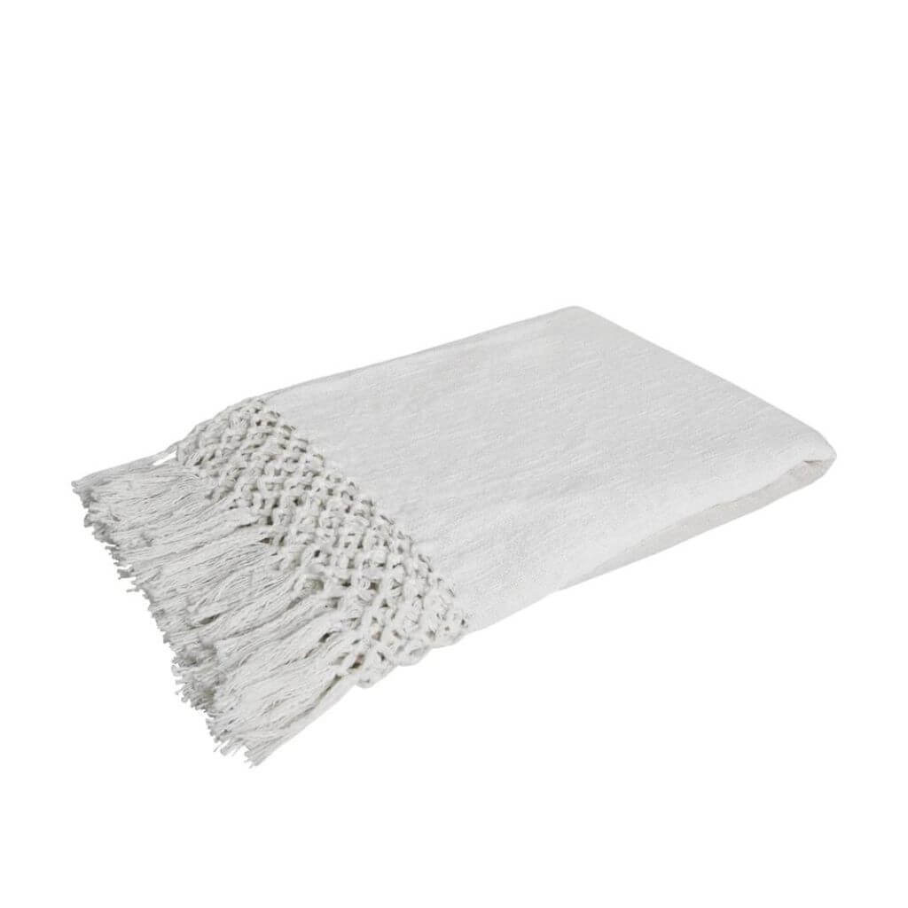 The Dove Cotton Throw in Ivory White measures 130cm x 170cm, perfect to decorate your bed or sofa