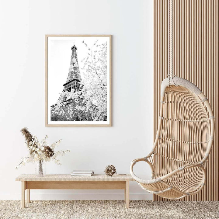 A black and white wall art photo print of the Eiffel Tower in Spring with a timber frame or unframed to decorate an empty wall