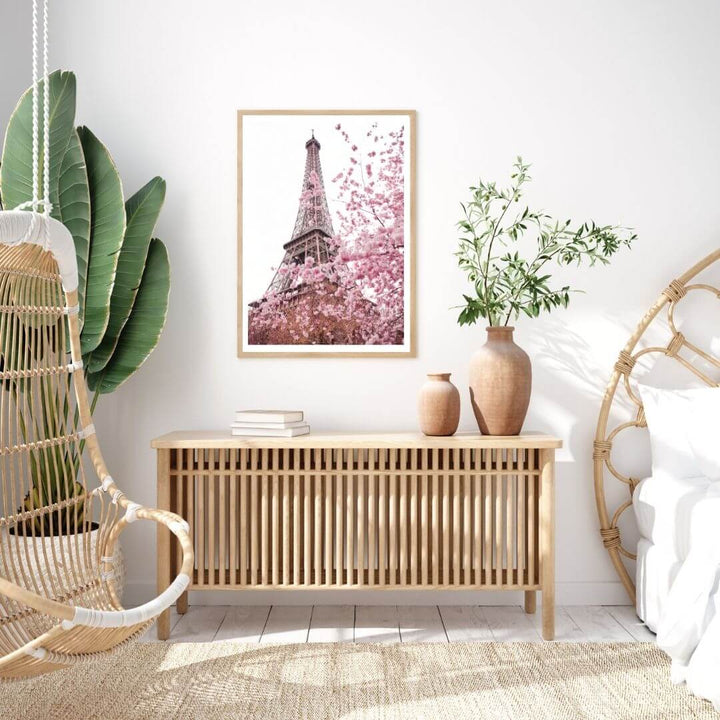 A wall art photo print of the Eiffel Tower in Spring with a timber frame to style your bedroom walls