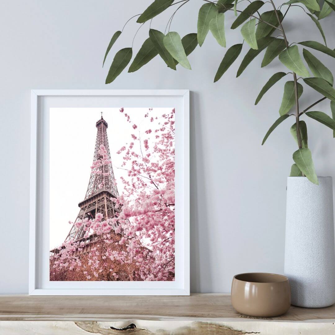 A wall art photo print of the Eiffel Tower in Spring with a white frame or unframed to decorate an empty wall