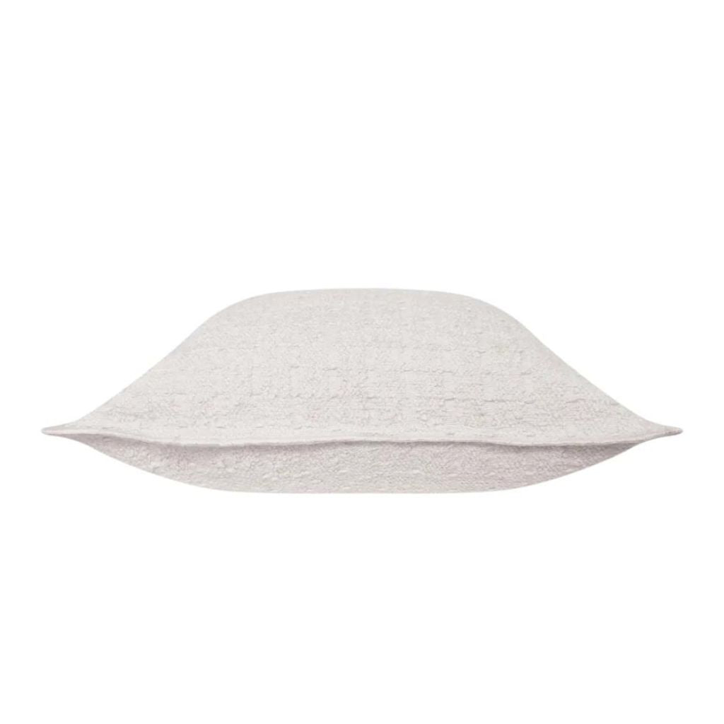 Side view of the Gemma Ivory Boucle Cushion, measuring 50cm is the perfect decorative cushion to style your bed or sofa.