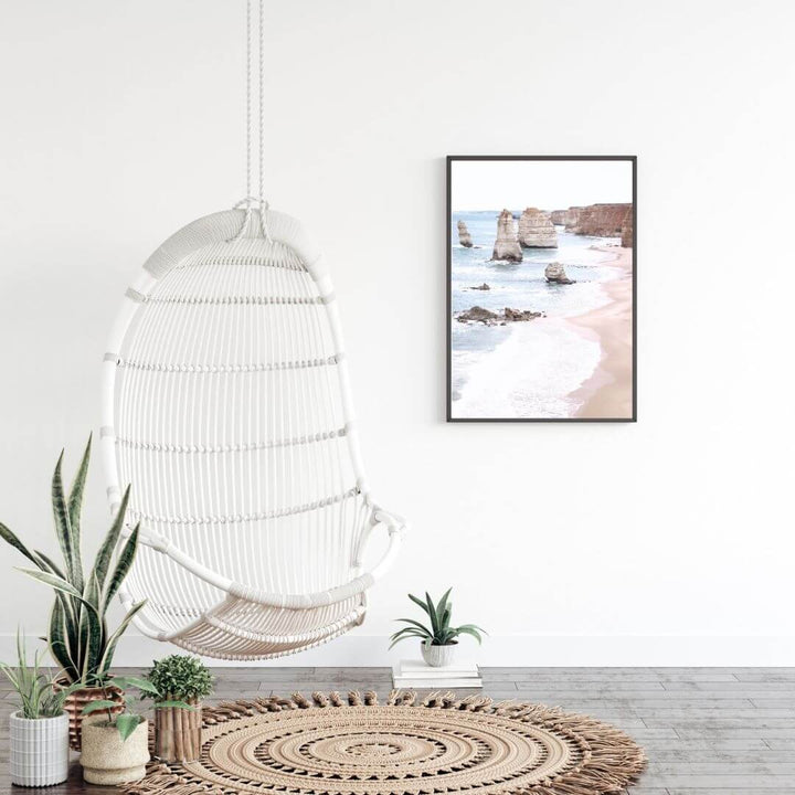 A wall art photo print of the Great Ocean Road A Twelve Apostles with a black frame to style a coastal Australian bedroom