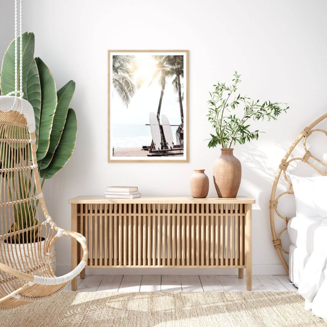 A coastal artwork of two white surfboards on a surfer beach in Hawaii under the palm trees on a surfer beach in Hawaii view.