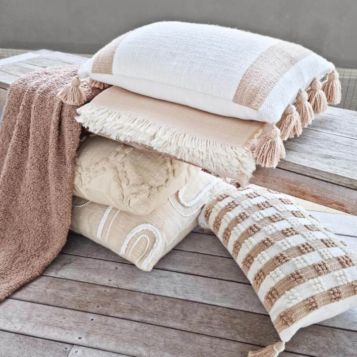 Styles well with cushions this beautiful Jade throw in warm taupe with a boucle pattern and tassels, measuring 130cm x 160cm, to style your bed or sofa.