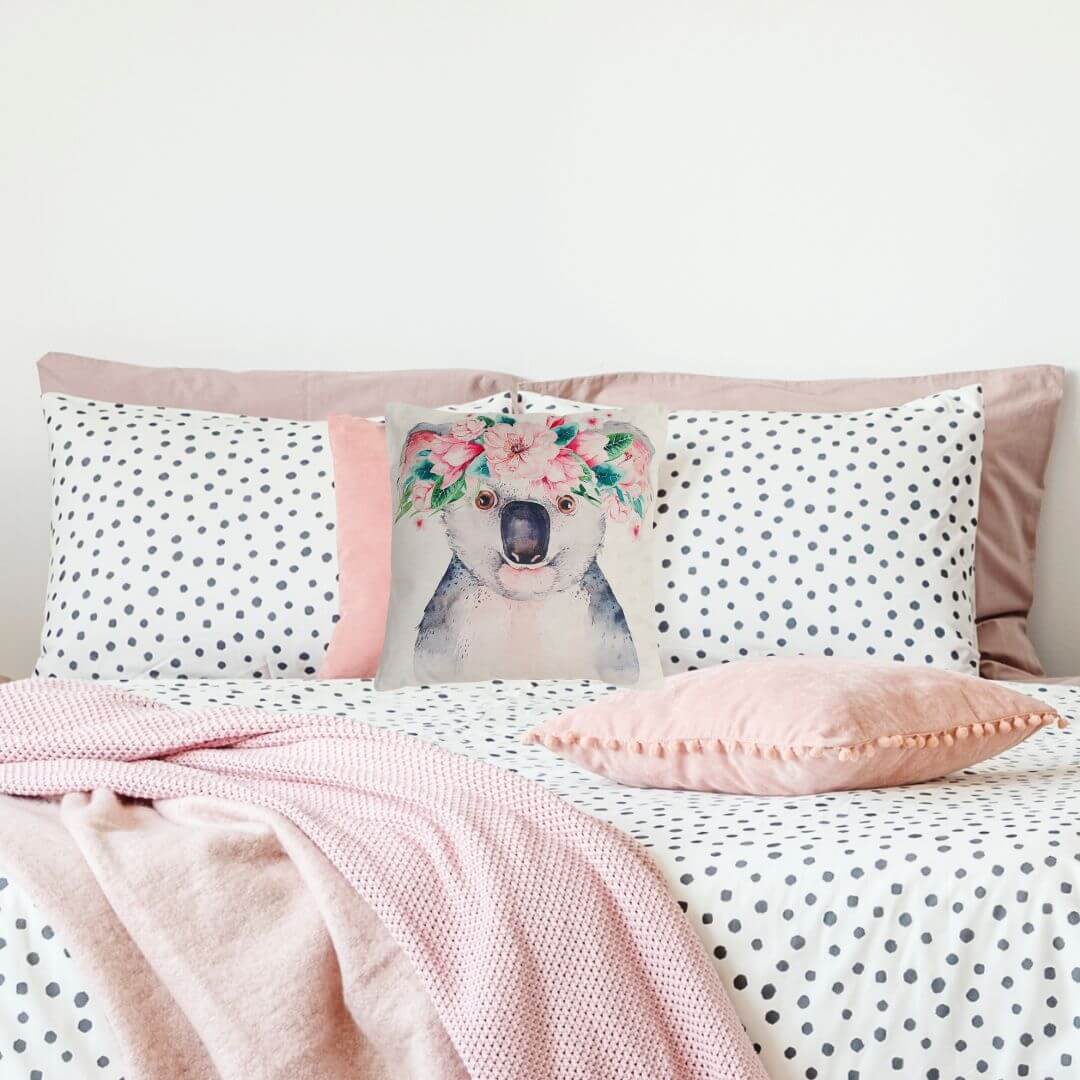 Square Kaia Koala Cushion in pastel pink and green – perfect for children's rooms