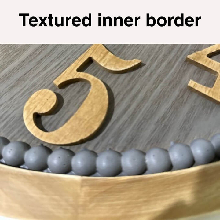 Wooden number '5' on a textured surface with gray beads border on the 60cm Contemporary Grey Timber Wall Clock