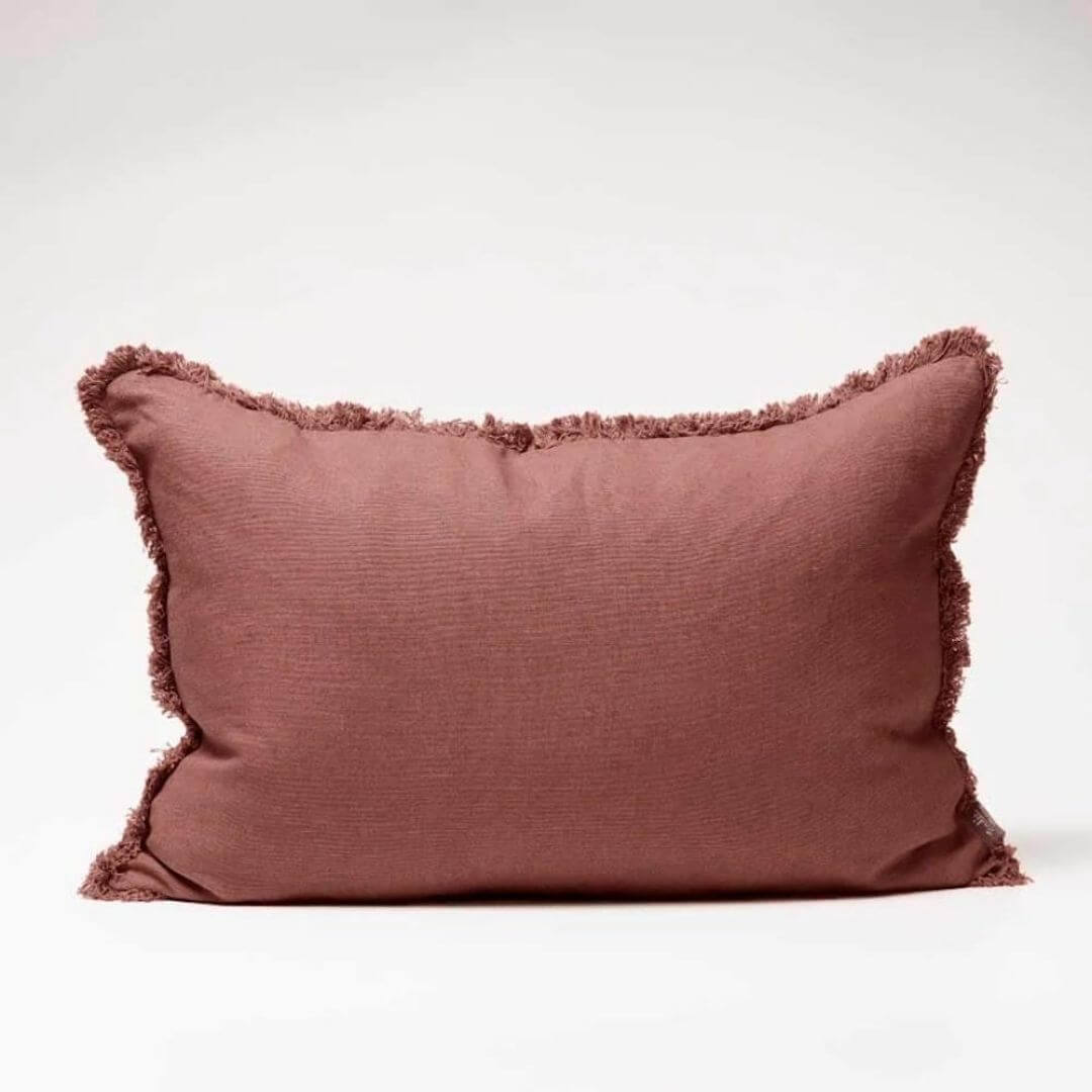 A Rectangle 40cm x 60cm Luca Boho  Boho Fringe Cushion in Desert Rose Red made with quality European linen.