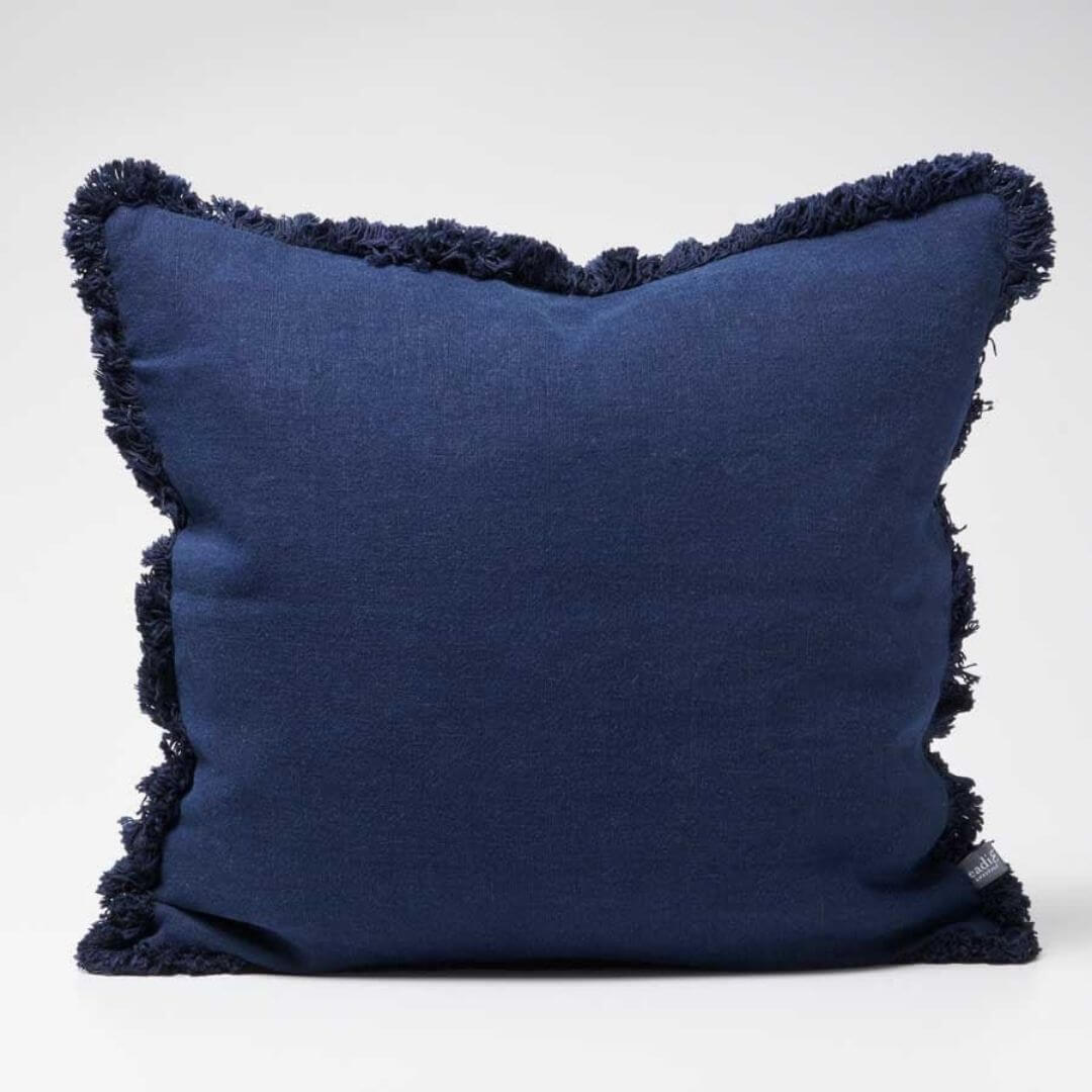 A stylish Navy Blue Square 50cm Luca Boho Fringe Cushion with cotton fringe edge for your Hamptons Coastal Home Decor.