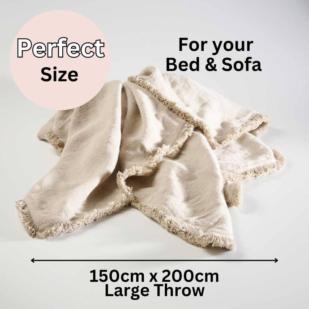 A large Luca Boho Fringe Linen Throw measuring 150cm x 200 cm to decorate your bedroom or living room