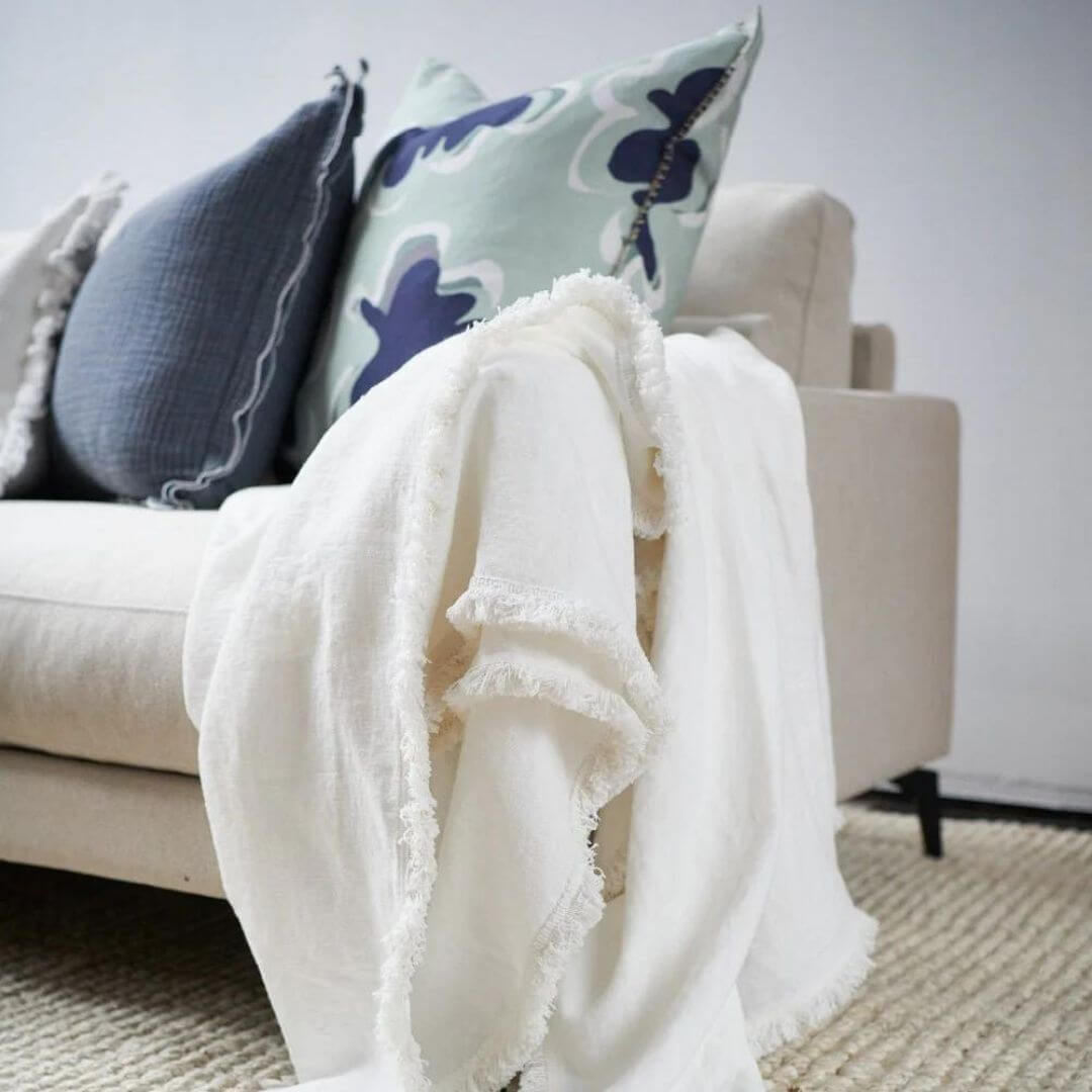 A stylish Off White Rectangle 40cm x 60cm Luca Boho Fringe Linen Cushion and throw bundle set for your Hamptons Coastal Home Decor.