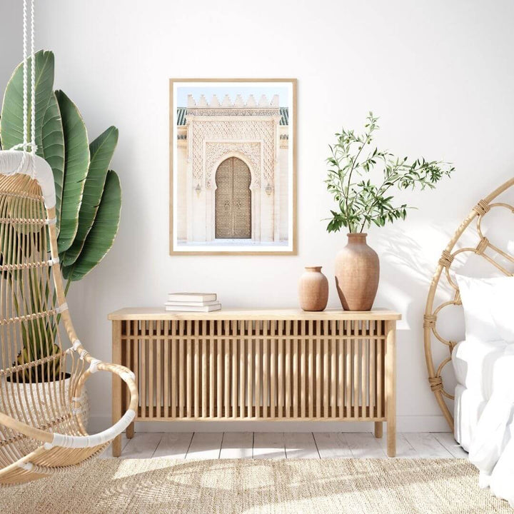 A wall art photo print of a Moroccan Temple Door with a timber frame to style a coastal Australian bedroom