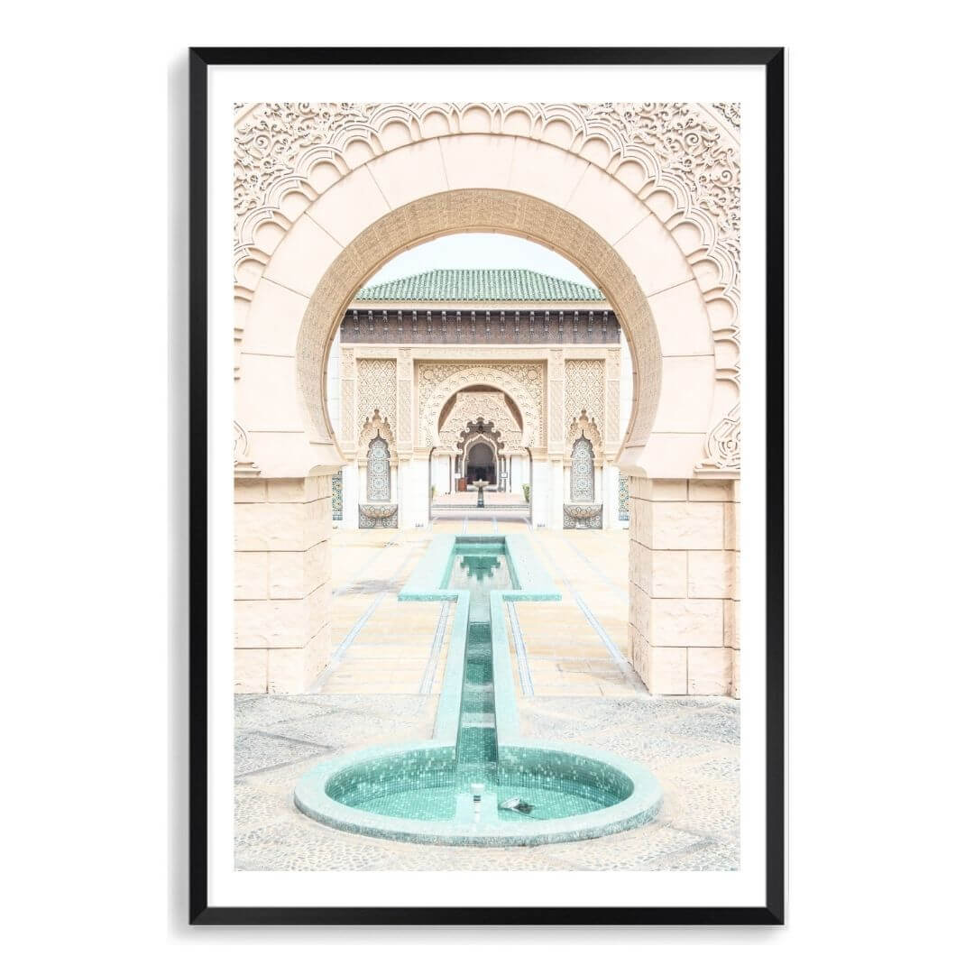 A wall art photo print of a Moroccan Temple water feature with a black frame, white border by Beautiful Home Decor