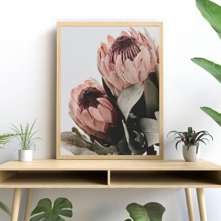 The wall art photo print of a peach protea floral b with a timber frame or unframed to decorate your console table