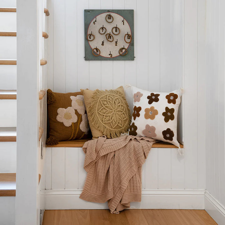 The Tanami Knitted Throw in Latte Brown styles well with a variety of design styles and cushions.